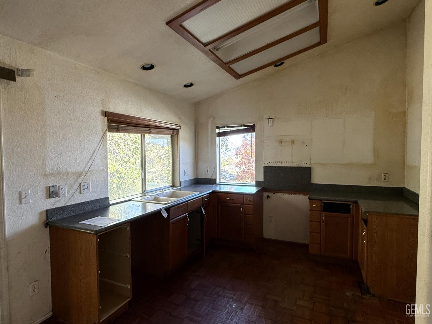 Undisclosed Address Tehachapi, CA 93561 - Photo 5 of 17 a kitchen with granite countertop sink cabinets and window