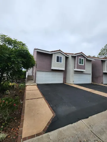 a house with trees in the background