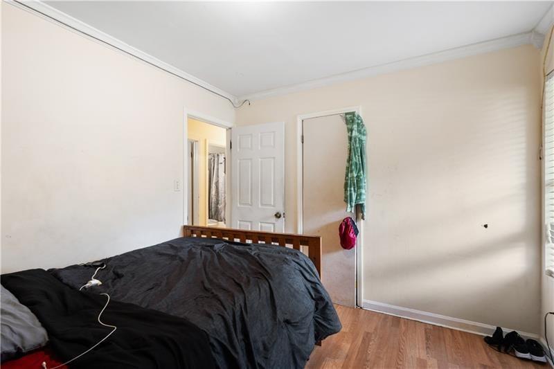 1496 Meadowlark Drive Decatur, GA 30032 - Photo 14 of 27 a bedroom with a bed and a window