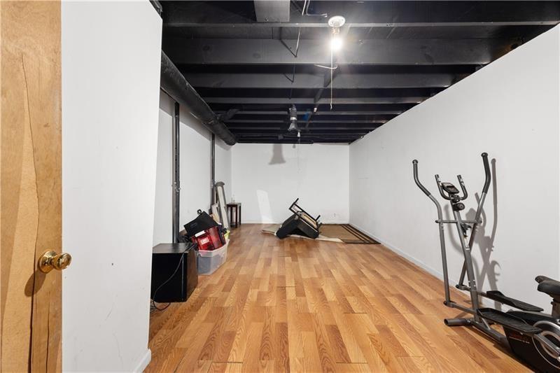 1496 Meadowlark Drive Decatur, GA 30032 - Photo 20 of 27 a view of a room with gym equipment