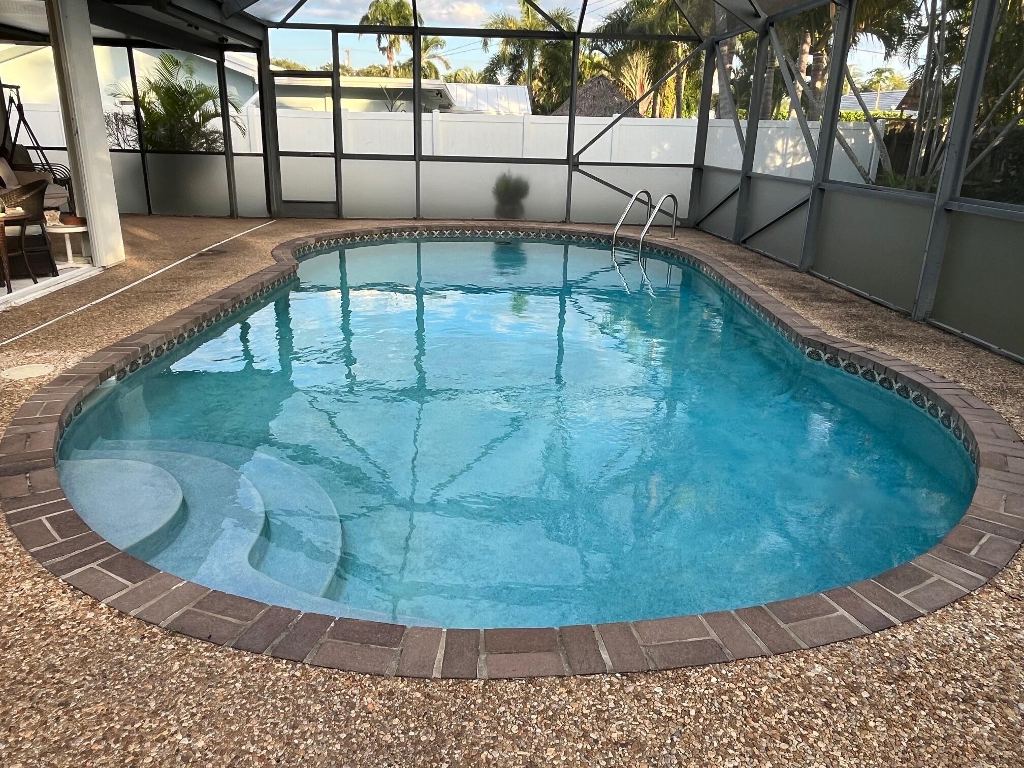 1260 Southwest 8th Street Boca Raton, FL 33486 - Photo 5 of 12 a view of a swimming pool