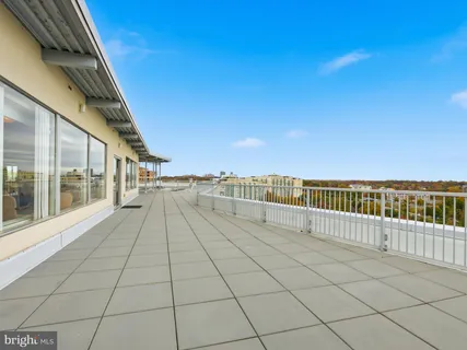 a kitchen with cabinets a sink and appliances