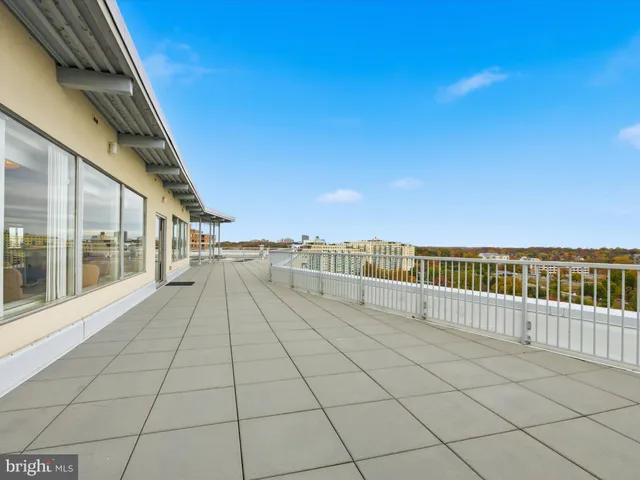 a kitchen with cabinets a sink and appliances
