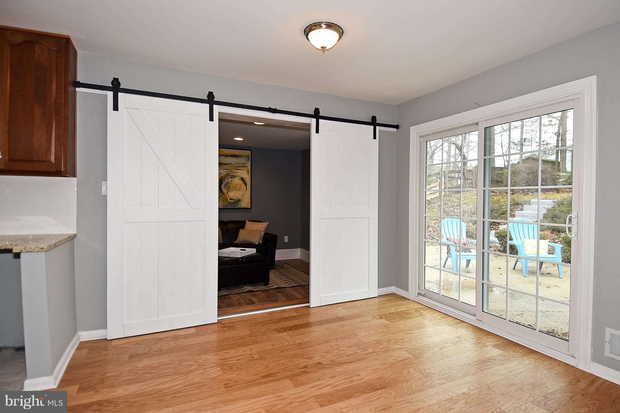 16016 Jerald Road Laurel, MD 20707 - Photo 13 of 41 Bonus room adjacent to kitchen w/ trendy barn door