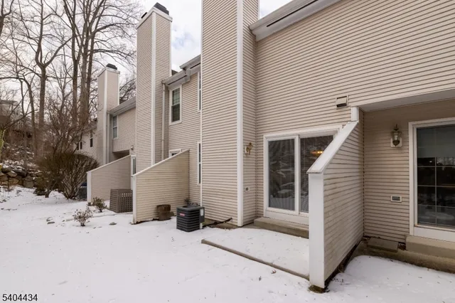 a view of a yard covered in snow