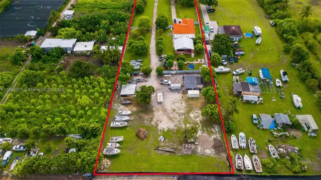a view of an ocean house and a yard