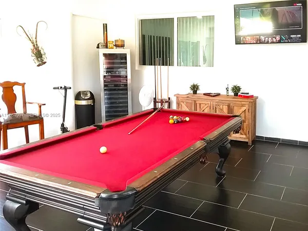 a kitchen with stainless steel appliances granite countertop a stove a sink dishwasher and cabinets