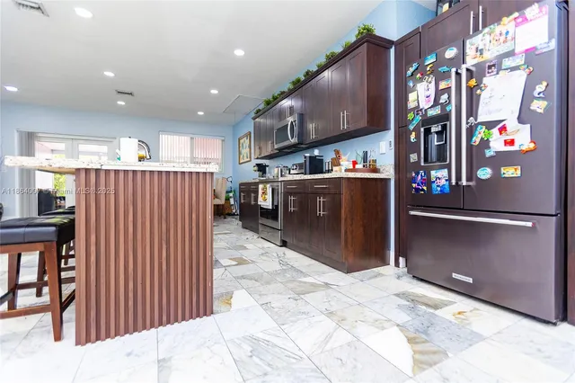 a view of yard with patio