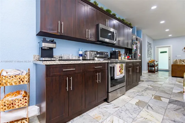 a view of a swimming pool with a patio