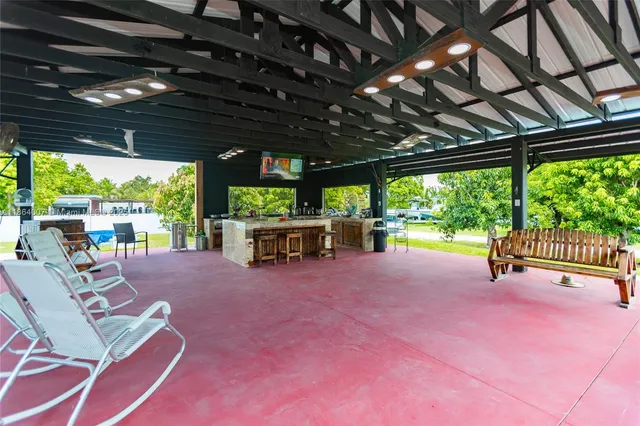 a white toilet sitting next to a bath tub
