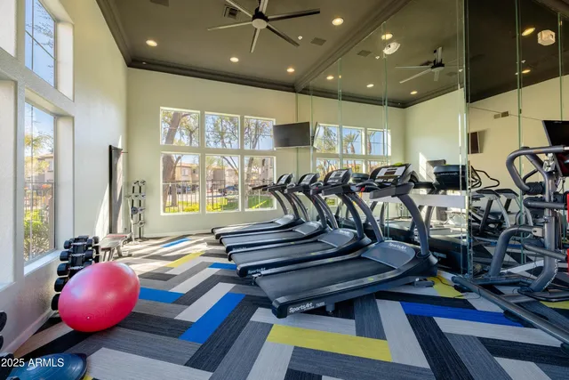 a room with lots of gym equipment
