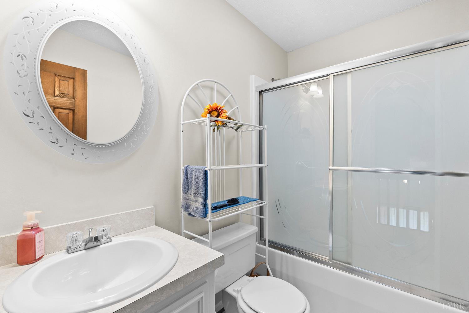 1159 Cifax Road Forest, VA 24551 - Photo 31 of 60 a bathroom with a sink toilet and shower