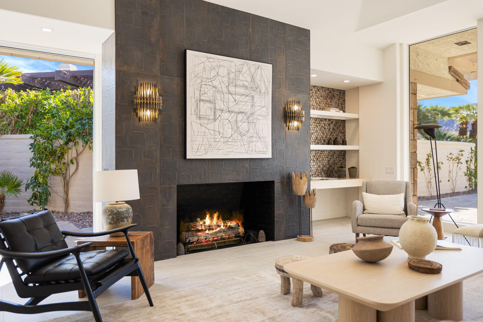 9 Regency Drive Rancho Mirage, CA 92270 - Photo 14 of 86 a living room with furniture and a fireplace