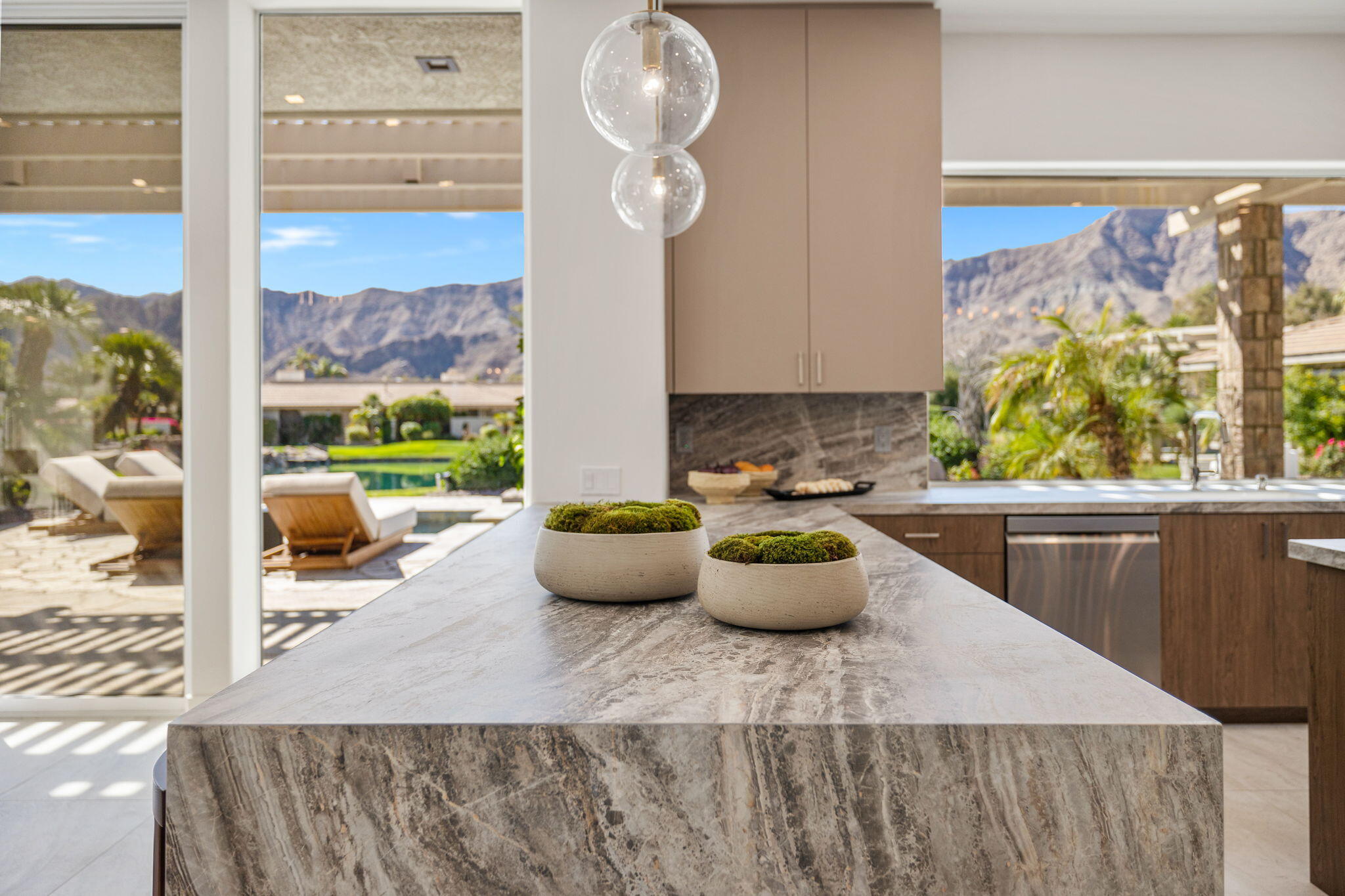 9 Regency Drive Rancho Mirage, CA 92270 - Photo 17 of 86 a view of a dining room with furniture window and outside view