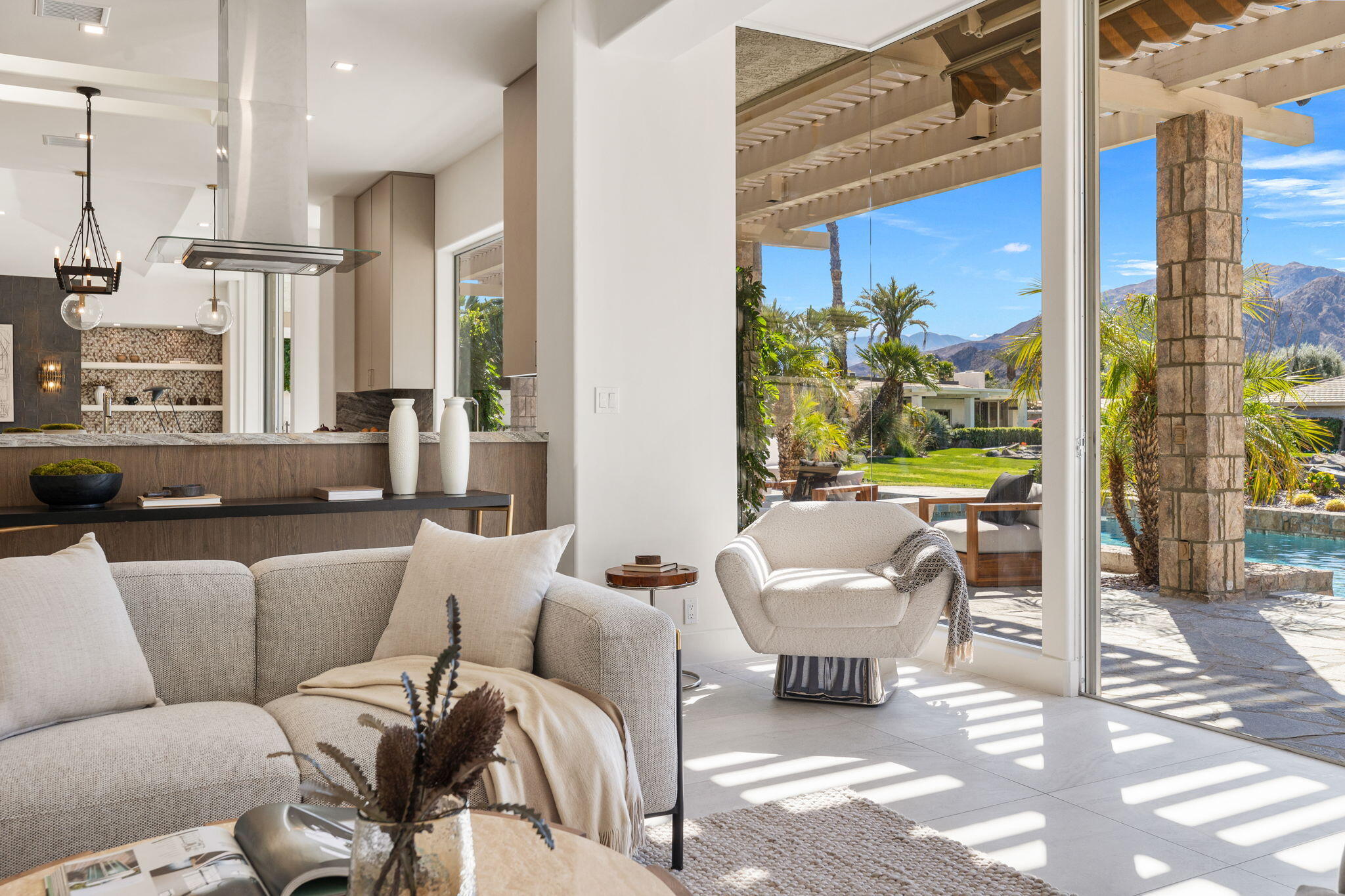 9 Regency Drive Rancho Mirage, CA 92270 - Photo 28 of 86 a living room with furniture and a large window