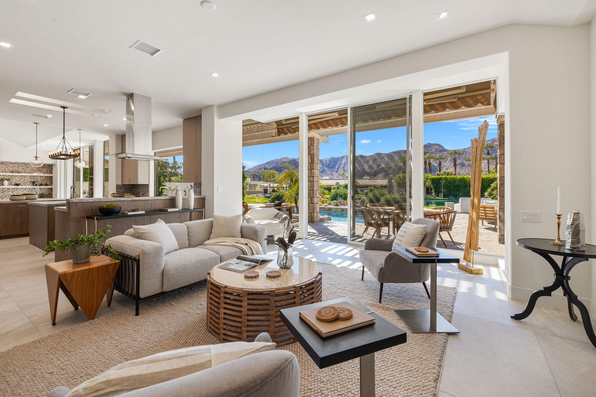 9 Regency Drive Rancho Mirage, CA 92270 - Photo 29 of 86 a living room with furniture and a large window