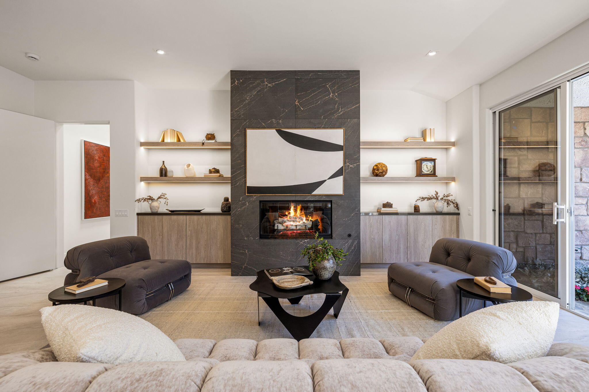 9 Regency Drive Rancho Mirage, CA 92270 - Photo 41 of 86 a living room with furniture and a fireplace
