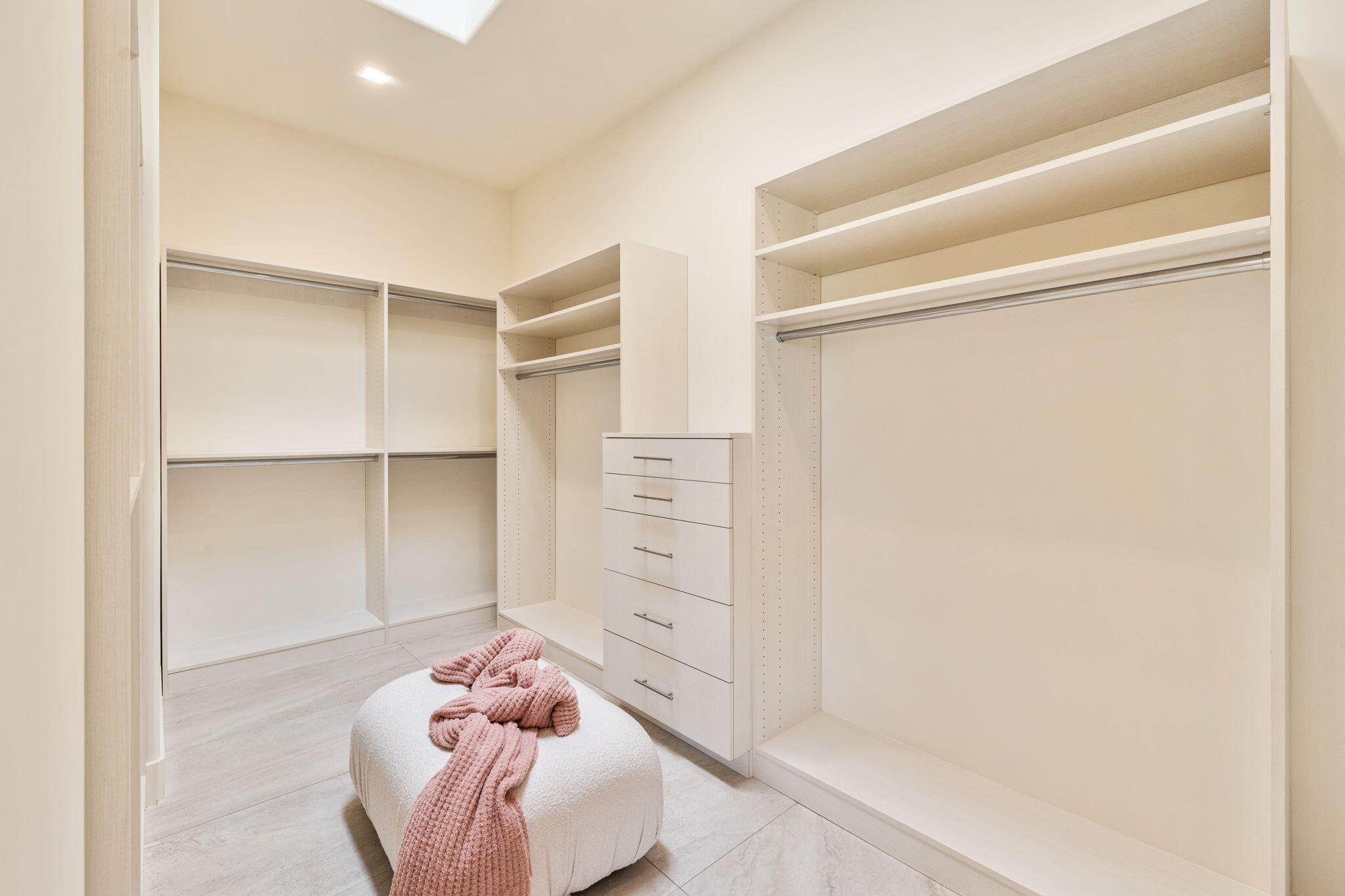 9 Regency Drive Rancho Mirage, CA 92270 - Photo 53 of 86 a living room with walk in closet and a couch