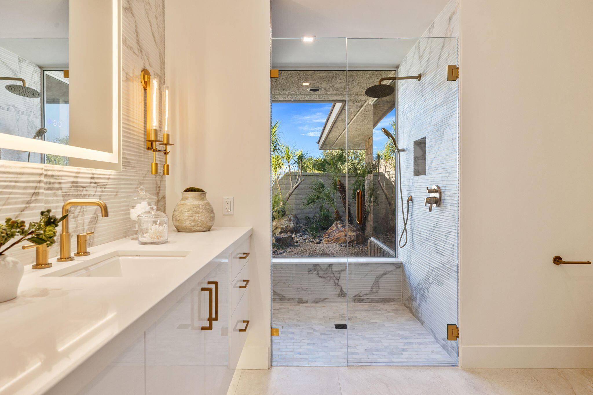 9 Regency Drive Rancho Mirage, CA 92270 - Photo 55 of 86 a bathroom with a granite countertop sink and a mirror