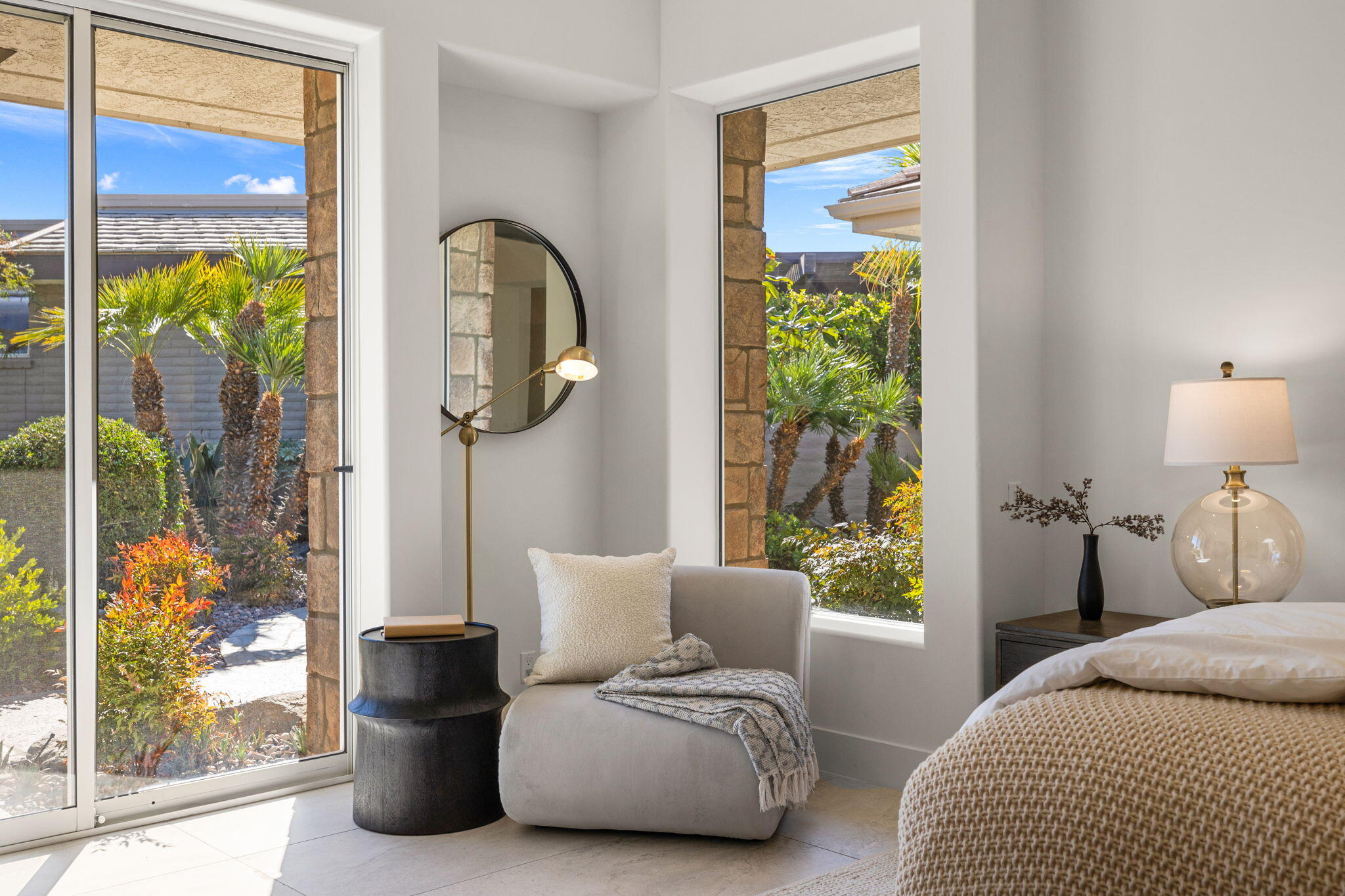 9 Regency Drive Rancho Mirage, CA 92270 - Photo 59 of 86 a bedroom with a bed and a painting on the wall