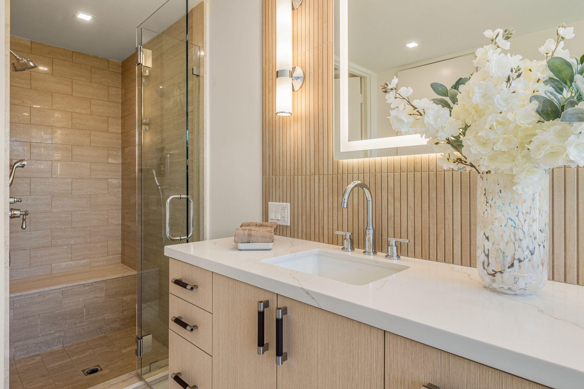 9 Regency Drive Rancho Mirage, CA 92270 - Photo 63 of 86 a bathroom with a sink mirror and a shower