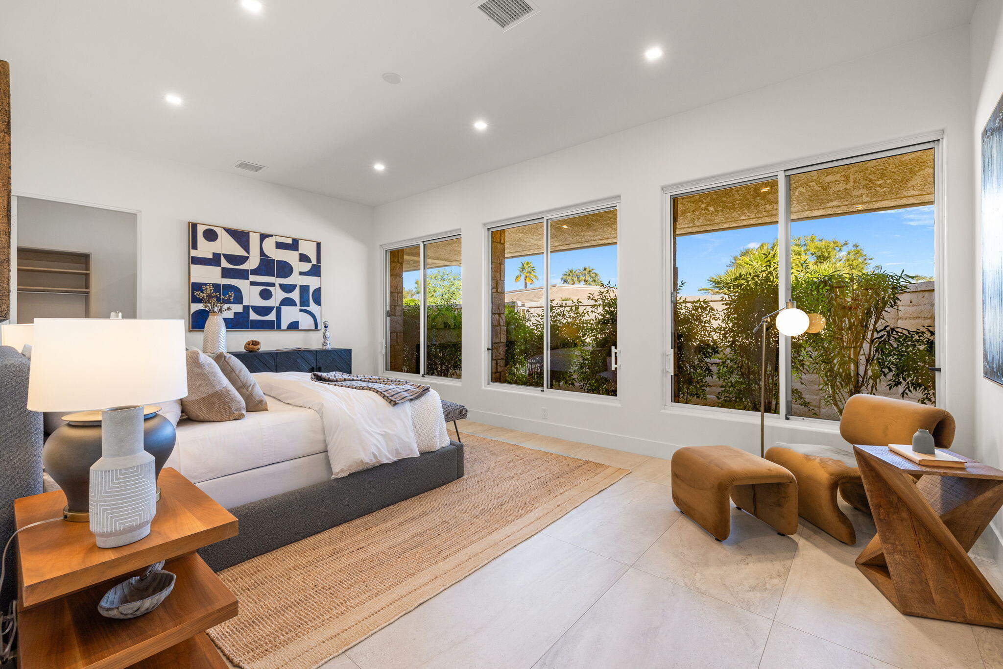 9 Regency Drive Rancho Mirage, CA 92270 - Photo 64 of 86 a bedroom with furniture and a large window
