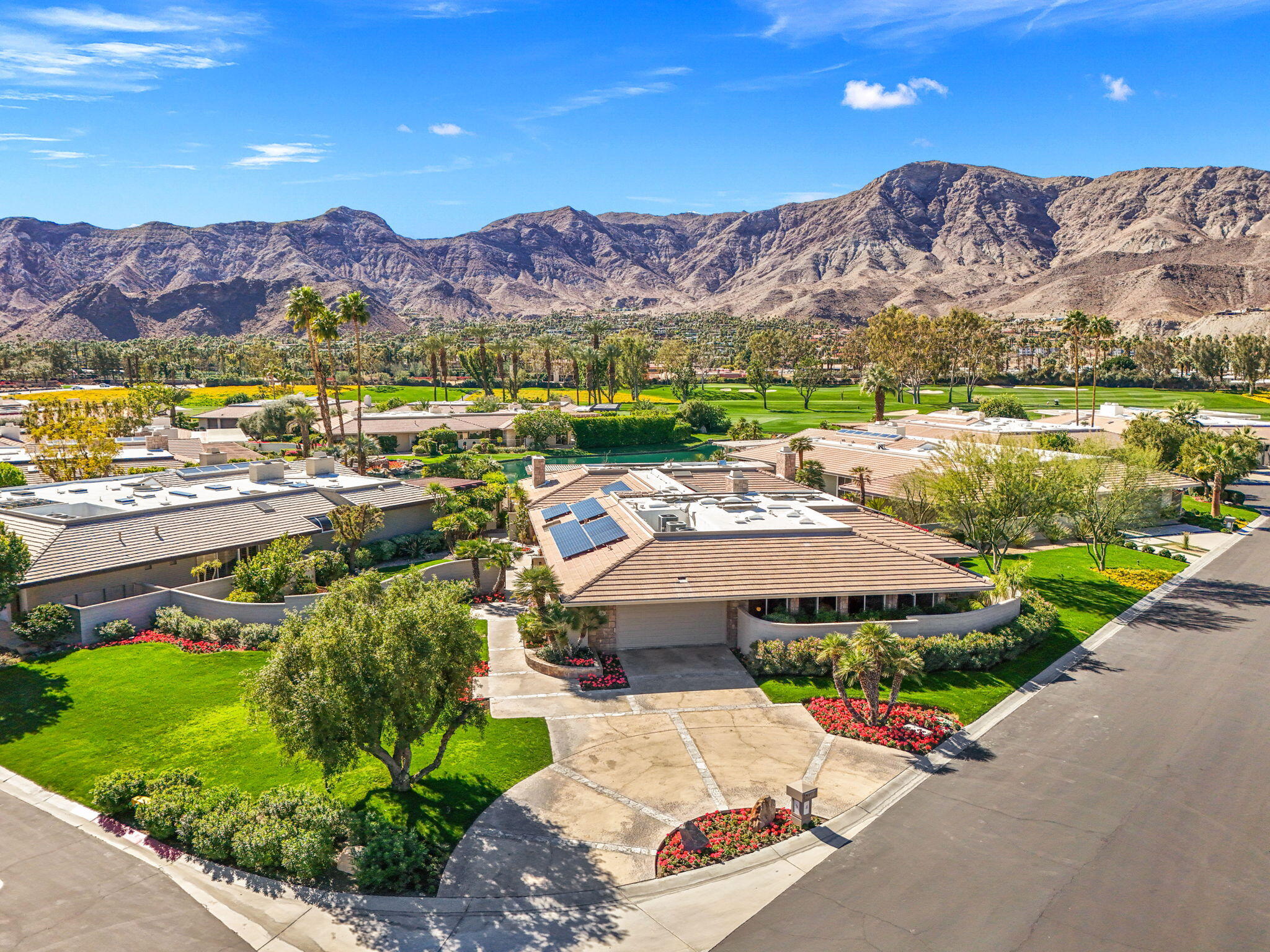 9 Regency Drive Rancho Mirage, CA 92270 - Photo 83 of 86 an aerial view of a house with a garden
