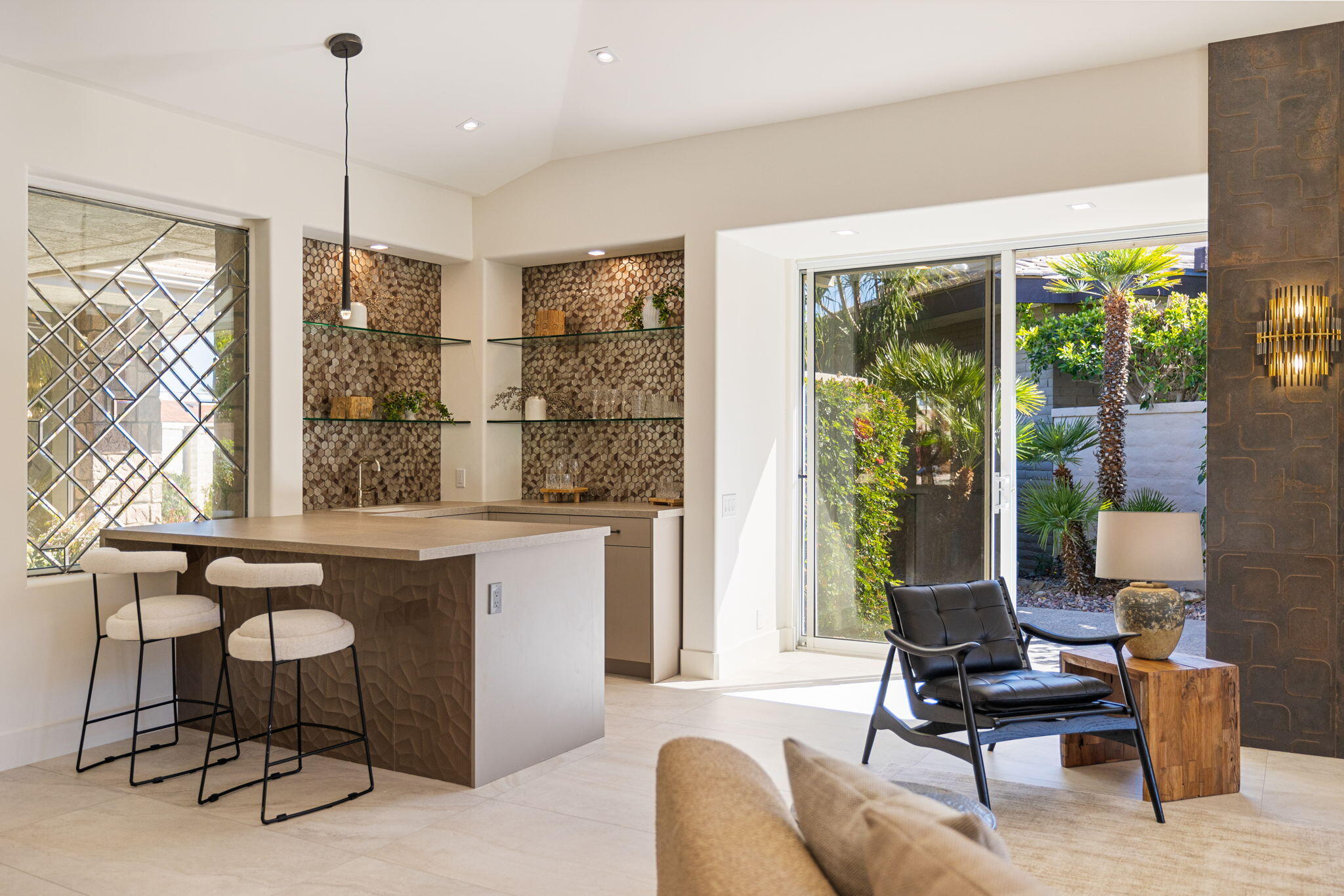 9 Regency Drive Rancho Mirage, CA 92270 - Photo 10 of 86 a living room with furniture and floor to ceiling windows