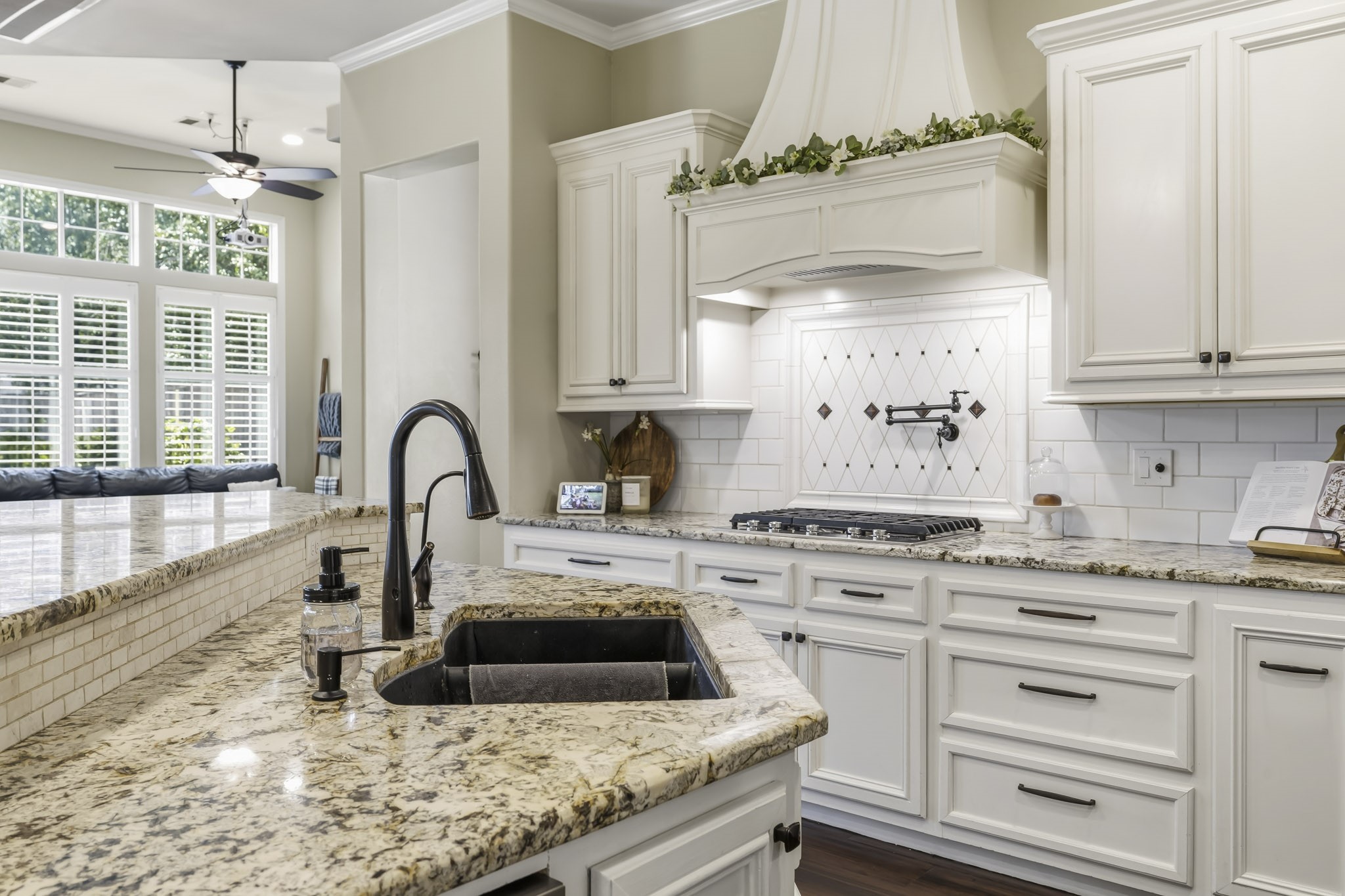 3630 Orca Court Spring, TX 77388 - Photo 30 of 50 Your Gourmet Kitchen Features Gas Appliances, Pot Filler, Soft Close & Huge Island w/ Breakfast Bar Seating!