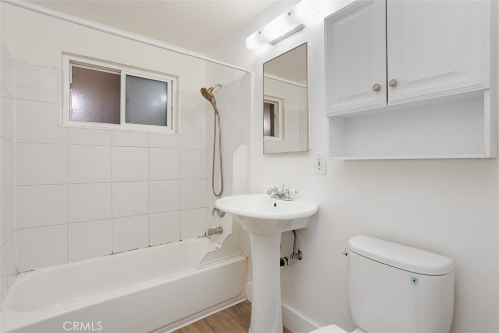 1710 Valley Place Carlsbad, CA 92008 - Photo 20 of 31 a bathroom with a sink toilet and bathtub