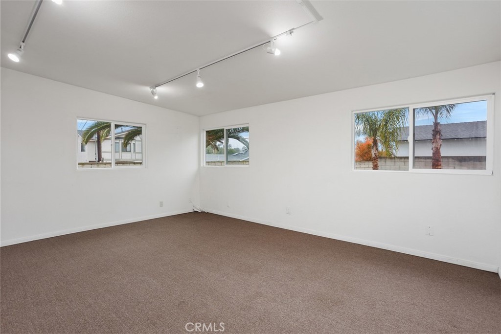 1710 Valley Place Carlsbad, CA 92008 - Photo 23 of 31 an empty room with windows