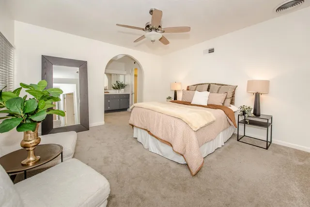 a bathroom with a sink a vanity and a mirror