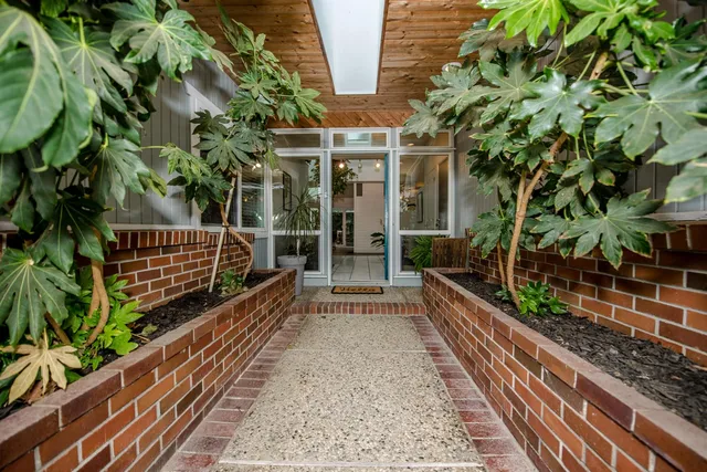 a living room with furniture and a table