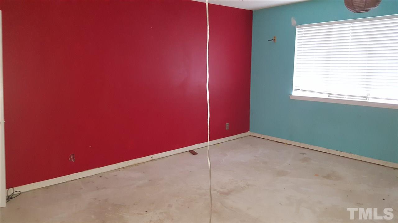 3088 Colony Road, Unit D Durham, NC 27705 - Photo 11 of 11 a view of an empty room with a window