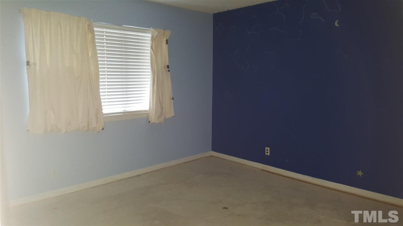 3088 Colony Road, Unit D Durham, NC 27705 - Photo 10 of 11 a view of an empty room with a window