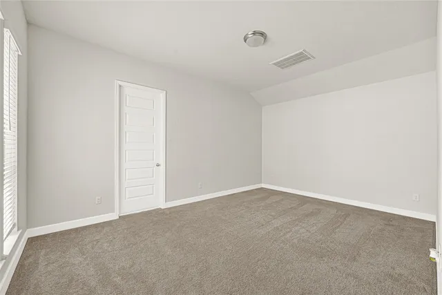 an empty room with an entryway