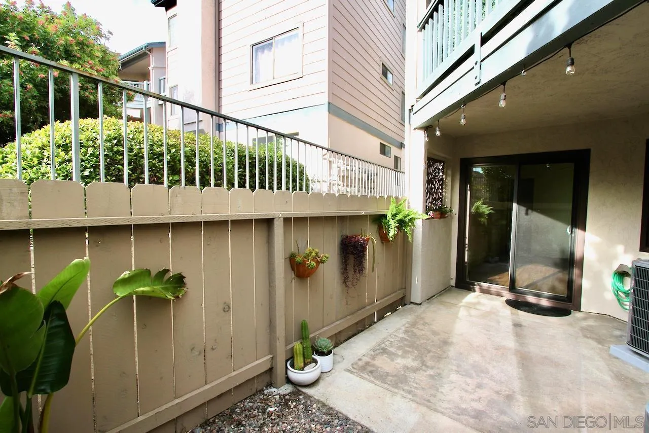 3021 Golden Oak Way Spring Valley, CA 91978 - Photo 14 of 20 a view of a house with a flower garden