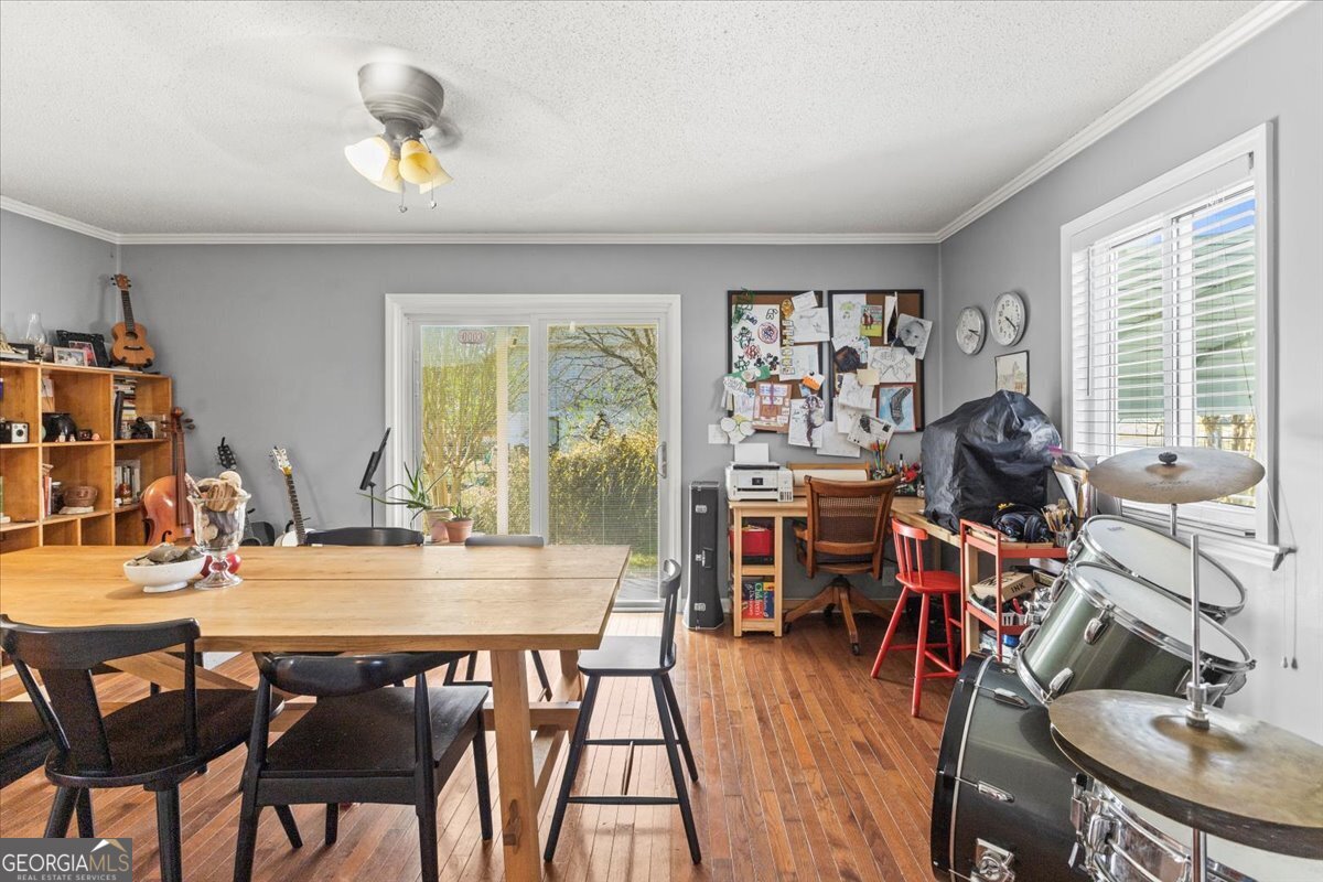 252 Langley Drive LaFayette, GA 30728 - Photo 15 of 29 a view of a dining room with furniture and wooden floor