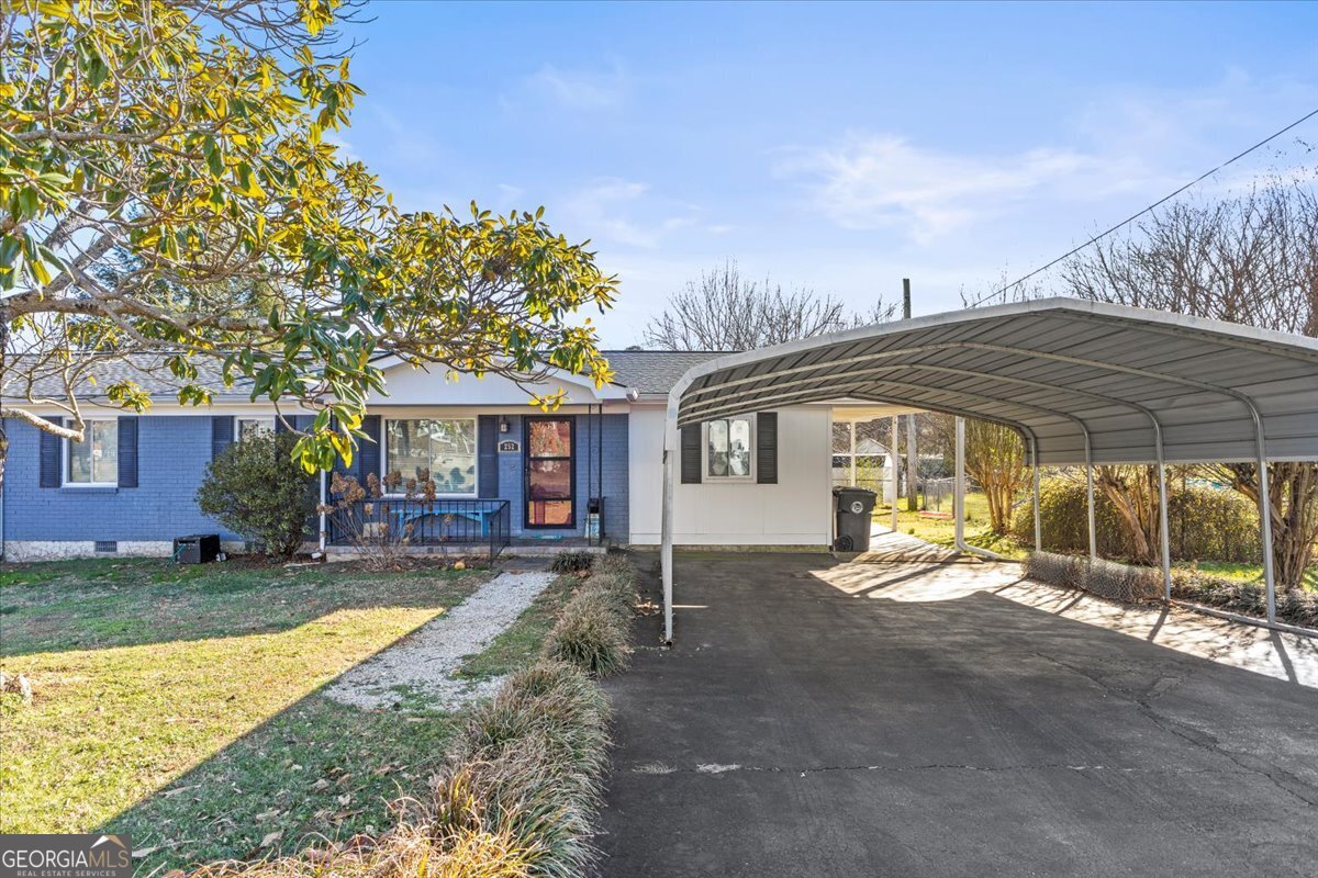 252 Langley Drive LaFayette, GA 30728 - Photo 3 of 29 a view of a house with backyard and porch