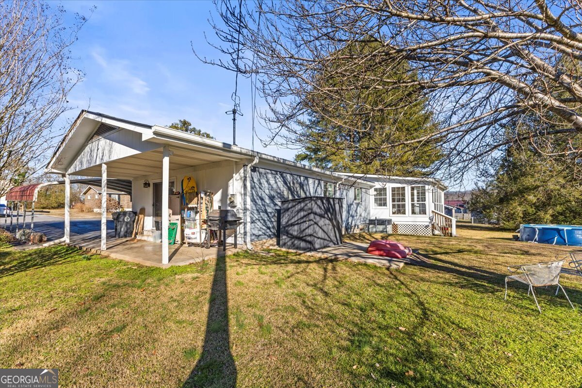 252 Langley Drive LaFayette, GA 30728 - Photo 8 of 29 a view of a house with swimming pool