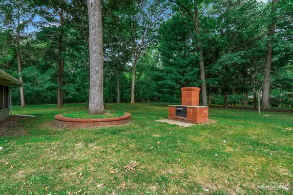 a view of a golf course with a lake