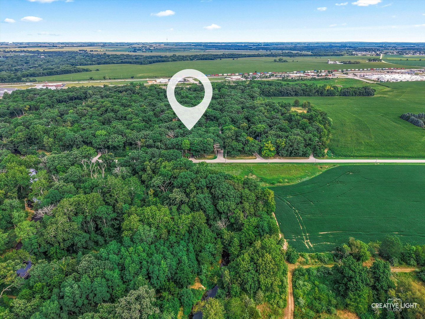 16323 Griswold Springs Road Plano, IL 60545 - Photo 46 of 55 a view of a golf course with a lake