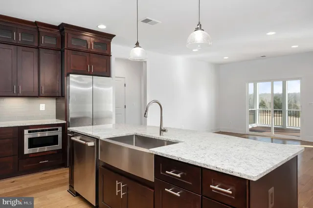 a view of balcony with wooden floor