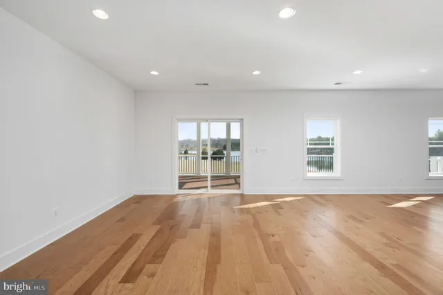 a view of deck with wooden floor and city view
