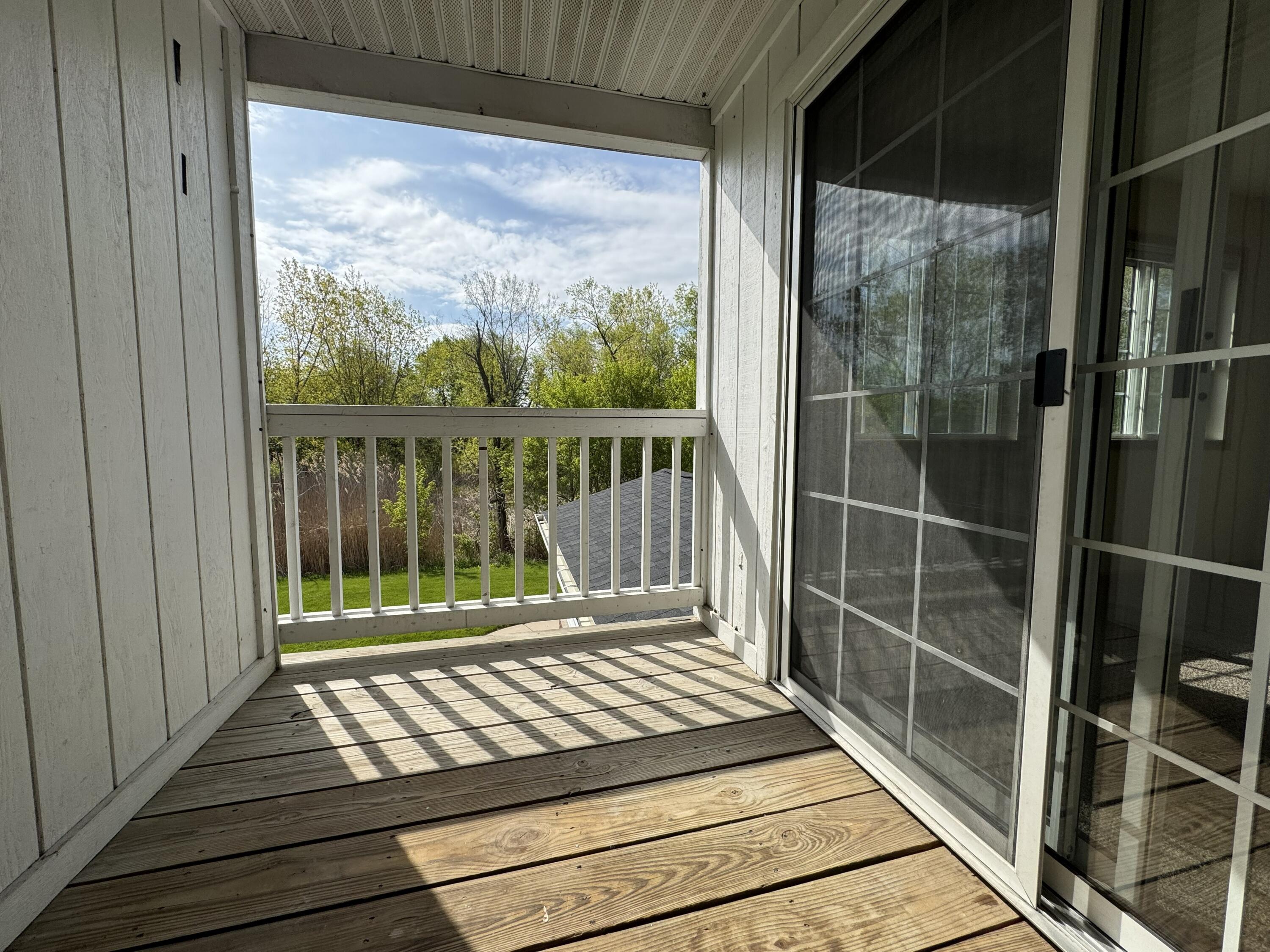 8055 Lexington Place, Unit 12 Pleasant Prairie, WI 53158 - Photo 10 of 22 balcony-1