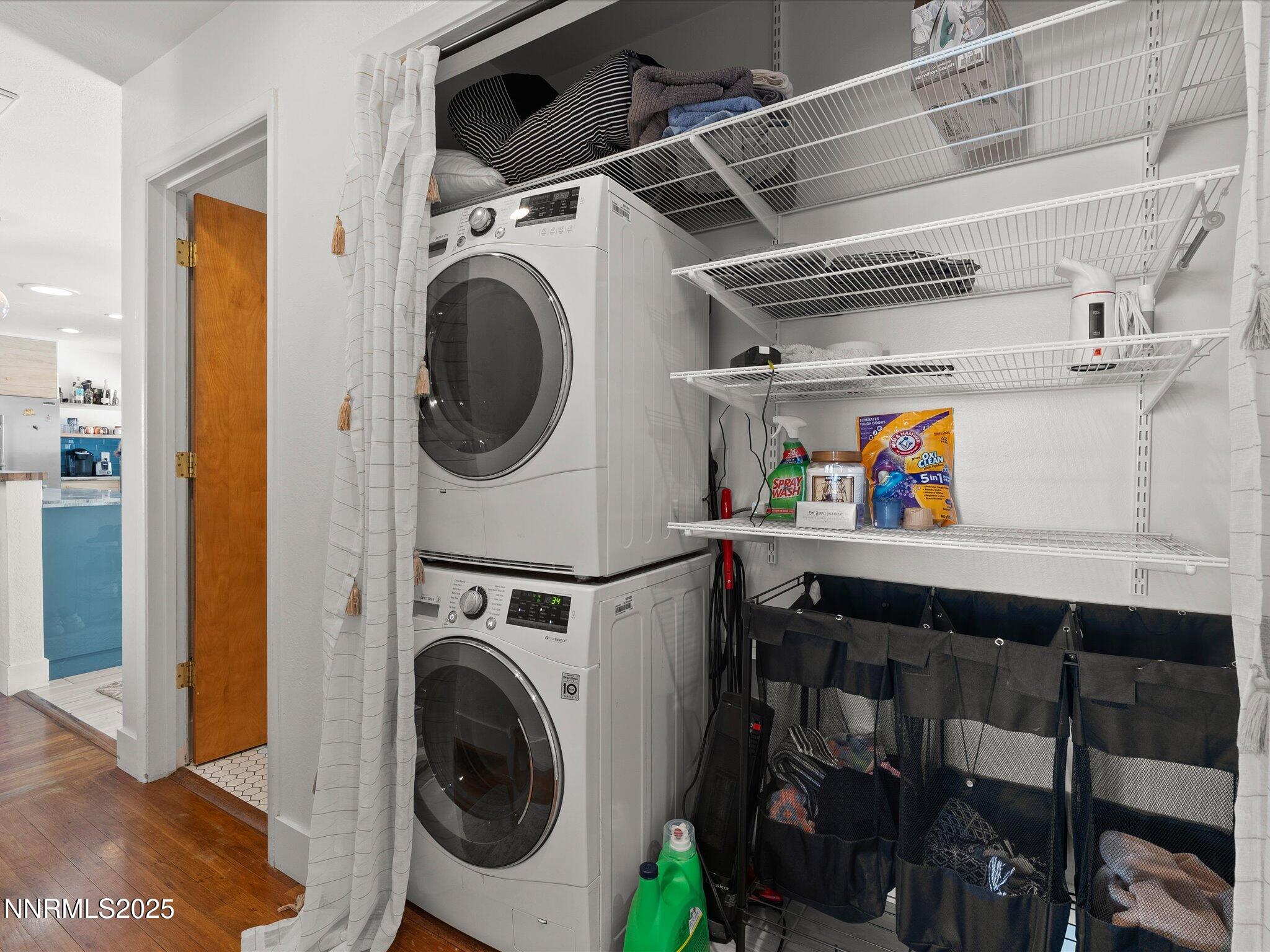 301 Hillcrest Drive Reno, NV 89509 - Photo 33 of 40 a utility room with dryer washer and a view of kitchen