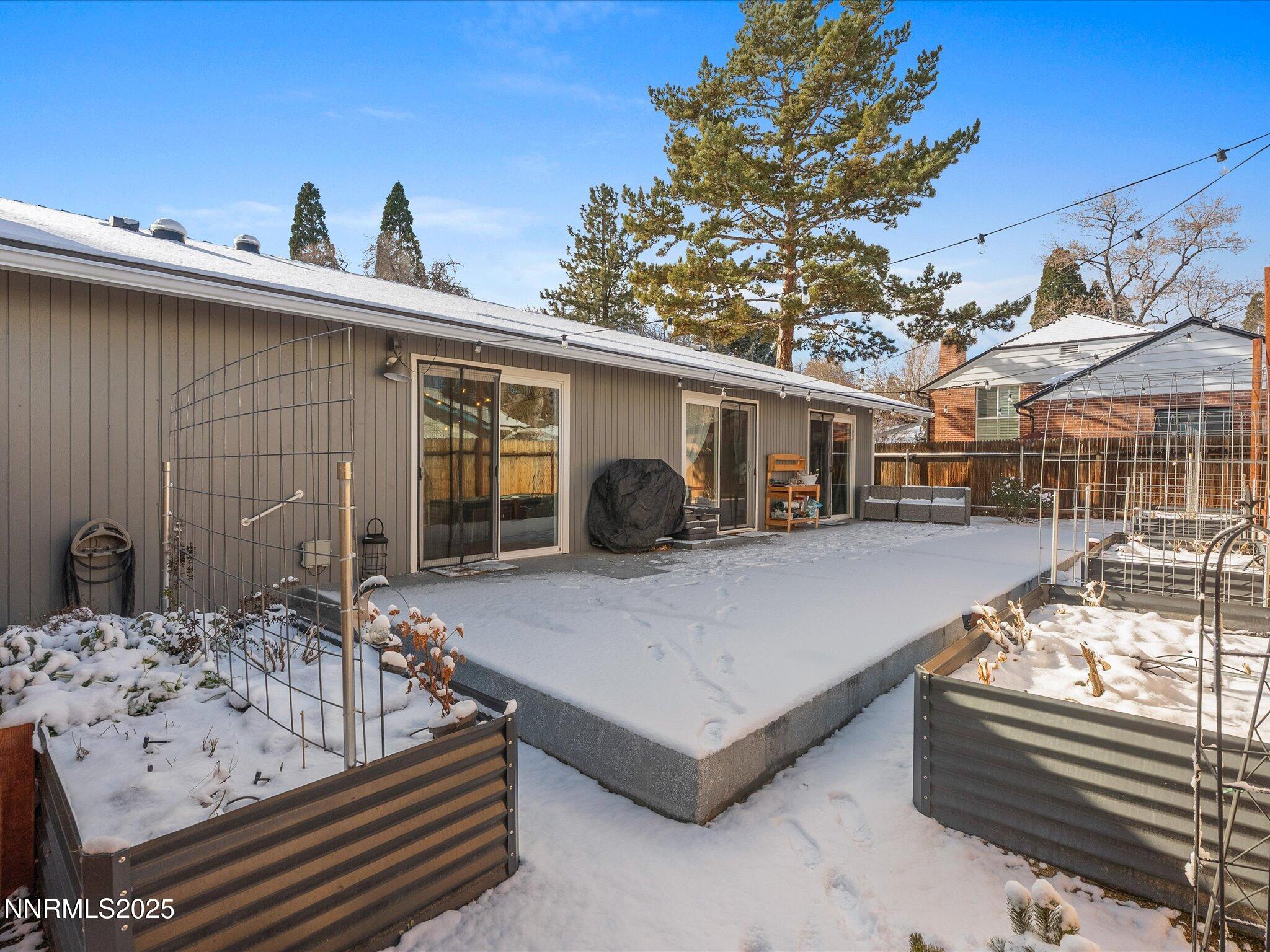 301 Hillcrest Drive Reno, NV 89509 - Photo 35 of 40 a view of a patio with couches table and chairs and potted plants