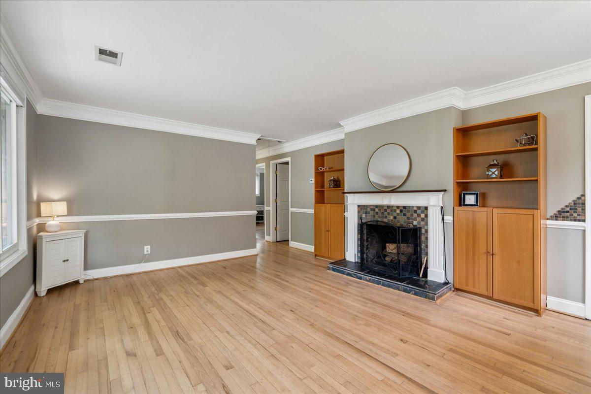 Spacious Living Room with Wood Burning Fireplace