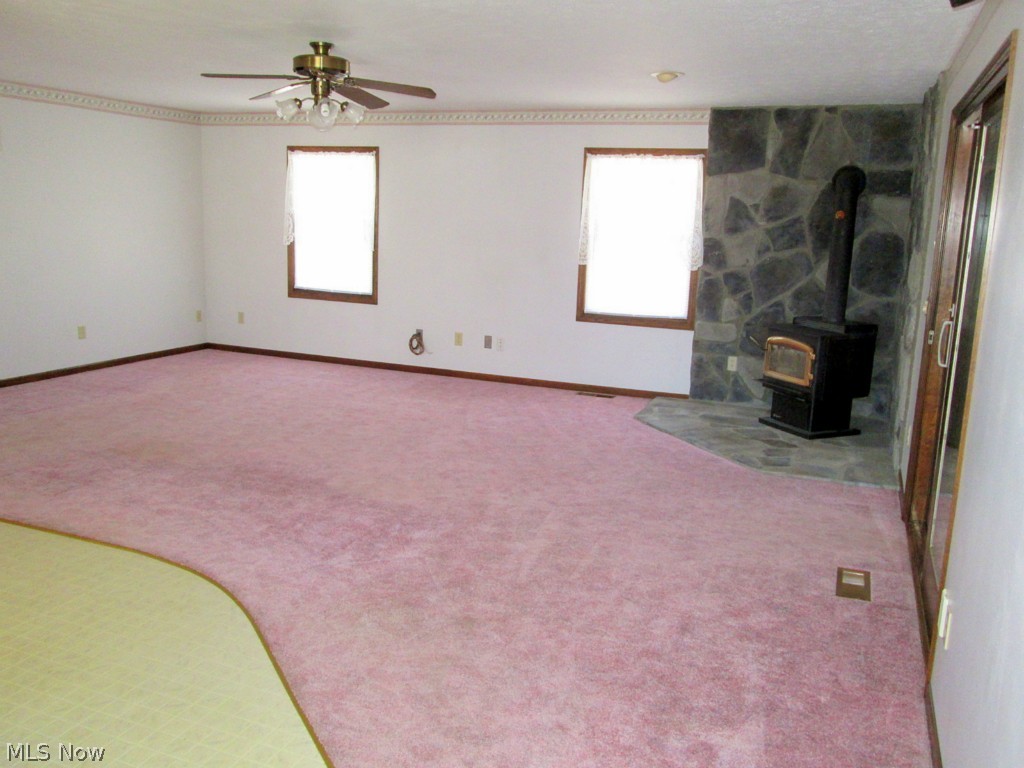 1573 Old Columbus Road Wooster, OH 44691 - Photo 5 of 14 The spacious Living Room with the woodburning stove - Just add furniture and a family!