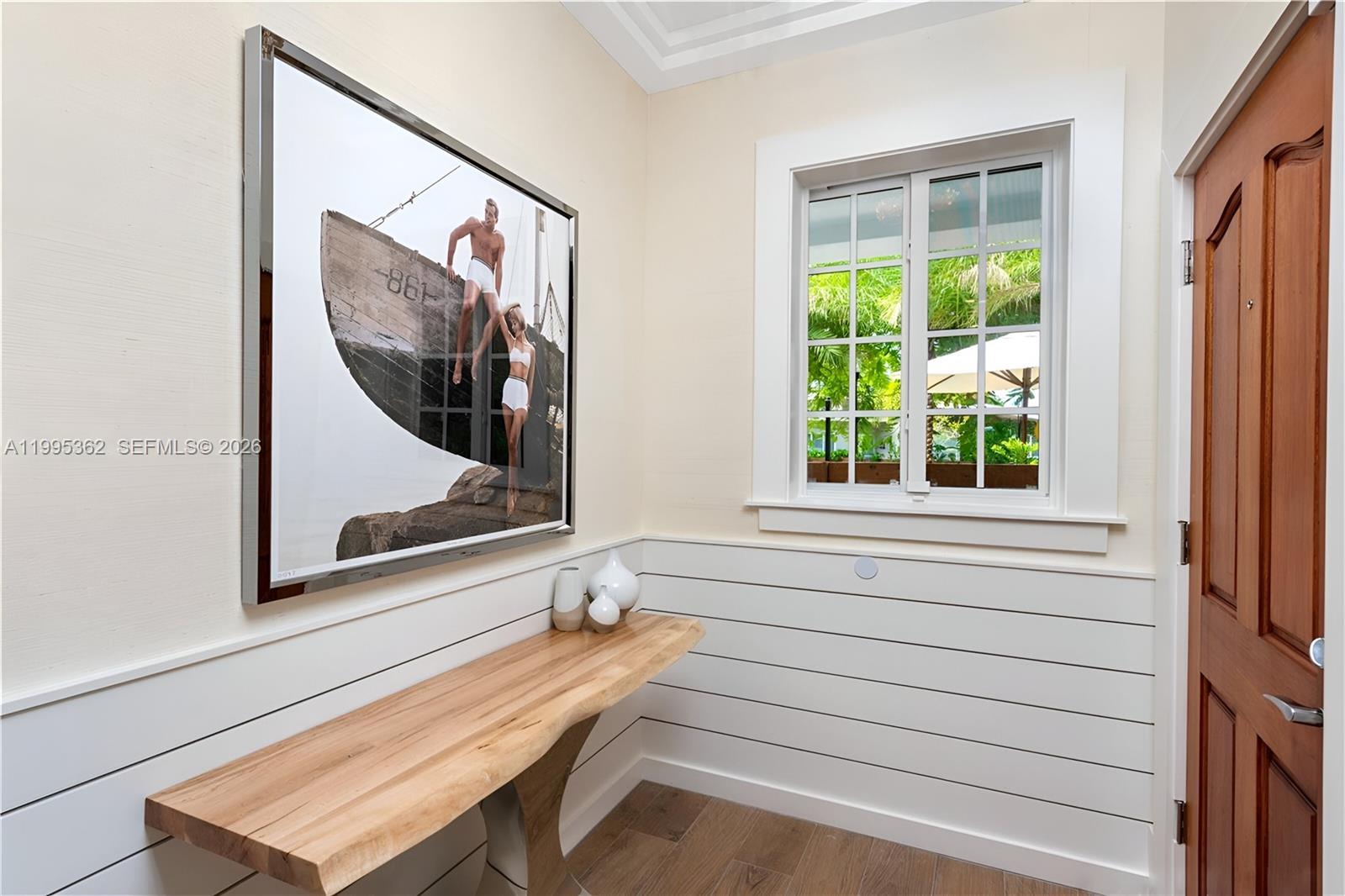 2575 Pine Tree Drive Miami Beach, FL 33140 - Photo 23 of 32 a view of room with window and furniture